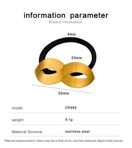 Detail of golden infinity symbol hair tie with brushed stainless steel texture and 52mm length