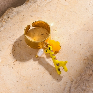 18k gold plated adjustable ring with giraffe pendant, pearl and yellow flower charms