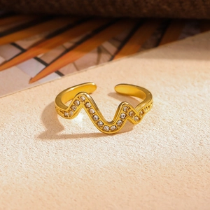 Adjustable gold plated stainless steel wave ring with sparkling cubic zirconia pavé
