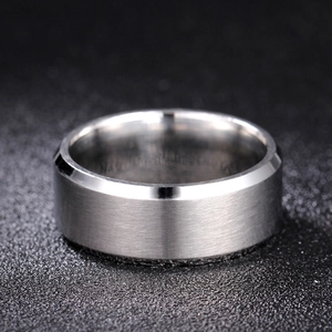 Detail of 316L titanium steel ring with brushed finish and beveled edges for men