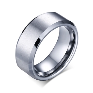 Close-up of matte brushed titanium ring featuring polished silver beveled edges