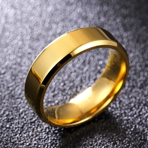 Macro shot of 8mm gold titanium ring with double beveled edges and polished finish