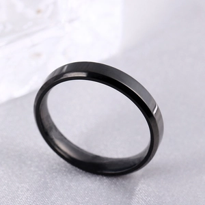 Polished 4mm black titanium steel ring with beveled edges shown at a 45-degree angle