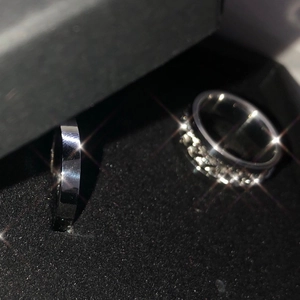 Silver stainless steel rings set with crystals in a premium black velvet jewelry gift box
