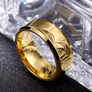 Macro view of a 8mm golden titanium steel ring with polished beveled edges