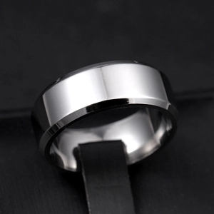 Macro shot of 8mm silver steel ring with double beveled edges and polished finish