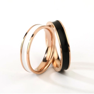 Rose gold stainless steel rings set with black and white ceramic inlay for couples