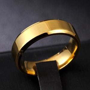 Close-up of polished 8mm golden titanium steel ring with double beveled edges