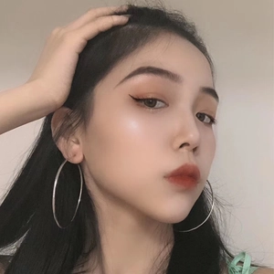 Classic silver titanium steel hoop earrings for women with elegant engraved patterns