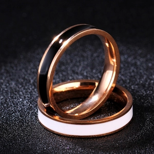 18k rose gold minimalist stackable rings with black and white enamel inlays