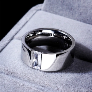 Polished 8mm stainless steel ring with rectangle zircon inlay on grey velvet display