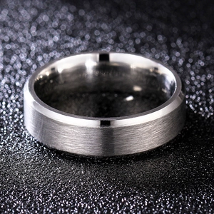 Macro shot of 8mm brushed stainless steel ring with polished beveled edges and inner band