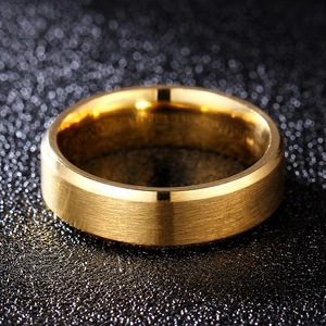 Detail of 8mm gold titanium steel ring with brushed finish and polished inner band