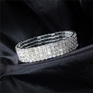 Sparkling four-row crystal stretch bracelet for brides featuring silver-plated rhinestones