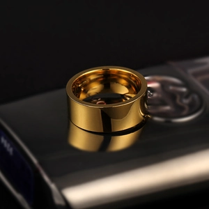 Polished 8mm gold-plated stainless steel ring showing a mirror-finish and smooth surface