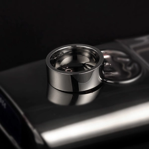 Macro shot of 8mm gunmetal black stainless steel ring with polished mirror finish