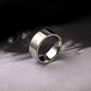 Detailed view of 8mm polished stainless steel ring with mirror finish on neutral background