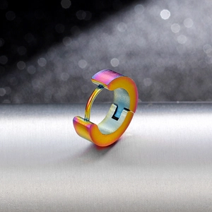 Macro shot of rainbow titanium steel hoop earring with vacuum plated gradient finish