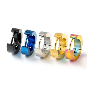 Detail showing five colors of titanium steel hoop earrings in black, gold, and rainbow