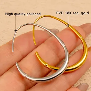 Polished geometric hollow curve earrings in silver and gold 18K PVD plated finish