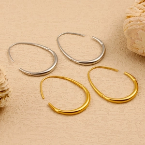 Minimalist teardrop open hoop earrings in polished 18K gold and silver finishes