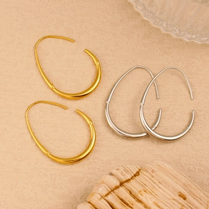 Polished hollow geometric hoop earrings in gold and silver finish with mirror luster