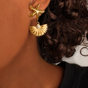 Elegant gold starfish drop earrings with white pearl detail for a summer ocean style