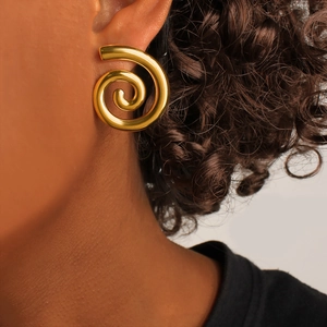 Golden spiral conch stud earrings in polished stainless steel for a minimalist beach style