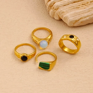 Vintage style gold stainless steel ring set with opal, malachite and black bead accents