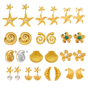Golden stainless steel ocean theme earrings set featuring starfish, shells, and pearls