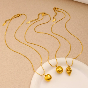 Minimalist stainless steel fruit pendant necklaces with apple and grape charms in gold
