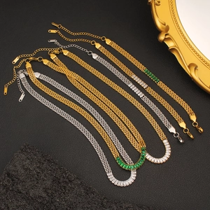 Detail of 18K stainless steel mesh chains with rectangular zircon pendants in gold and silver