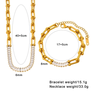 Detailed view of horseshoe link jewelry set with zircon showing necklace and bracelet specs