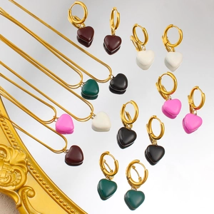 Detailed set of golden heart pendants necklaces and earrings in various enamel colors