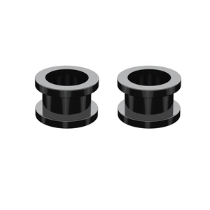 Macro view of high-polished black acrylic ear tunnels with double flared design