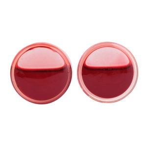 Pair of circular red liquid-filled ear plugs with transparent acrylic high-gloss finish