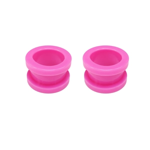 Detail of pink flexible silicone double-flared ear tunnel gauges with smooth hollow design