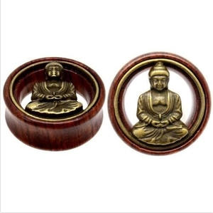 Pair of organic wood ear gauges featuring a vintage bronze Buddha head inlay design