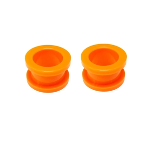 Detail view of bright orange acrylic ear tunnels with smooth edges and hollow core