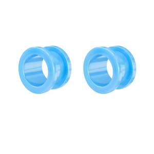 Macro view of bright blue translucent acrylic double flare ear tunnels jewelry