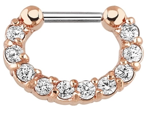Macro shot of rose gold nose clicker with eleven sparkling pavé-set round cubic zirconia