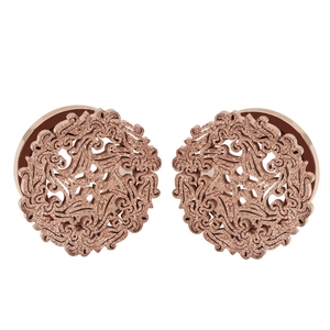 Rose gold stainless steel hollow floral ear plugs with matte finish on white background