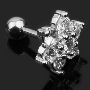 Macro view of a silver flower stud earring with six zircons and a ball screw back closure