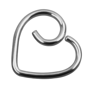 Macro shot of silver minimalist heart-shaped ear cuff with smooth metallic finish