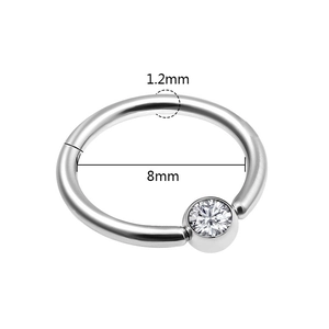Detail of 1.2mm segment ring with 8mm inner diameter and single clear zircon stone