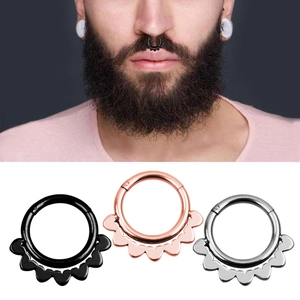 Three-piece septum ring set in black, rose gold, and silver finishes with wavy detail