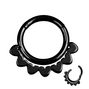 Detail view of black stainless steel nose ring showing hinged clicker mechanism and wavy design