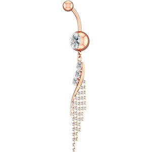 Detailed macro view of rose gold belly button ring with sparkling zircon tassel pendant