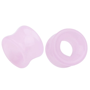Détail d'écarteurs de selle en verre rose clair creux avec fini translucide poli