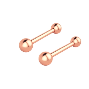 Detail view of rose gold barbell piercing jewelry with high-polished metallic finish